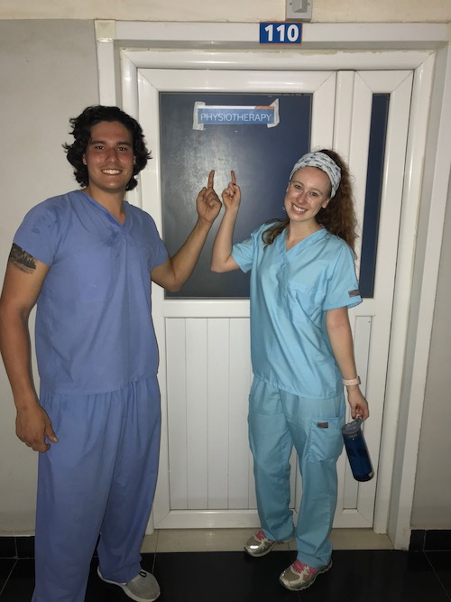 Student Makayla Mack with another student in front of the physical therapy department